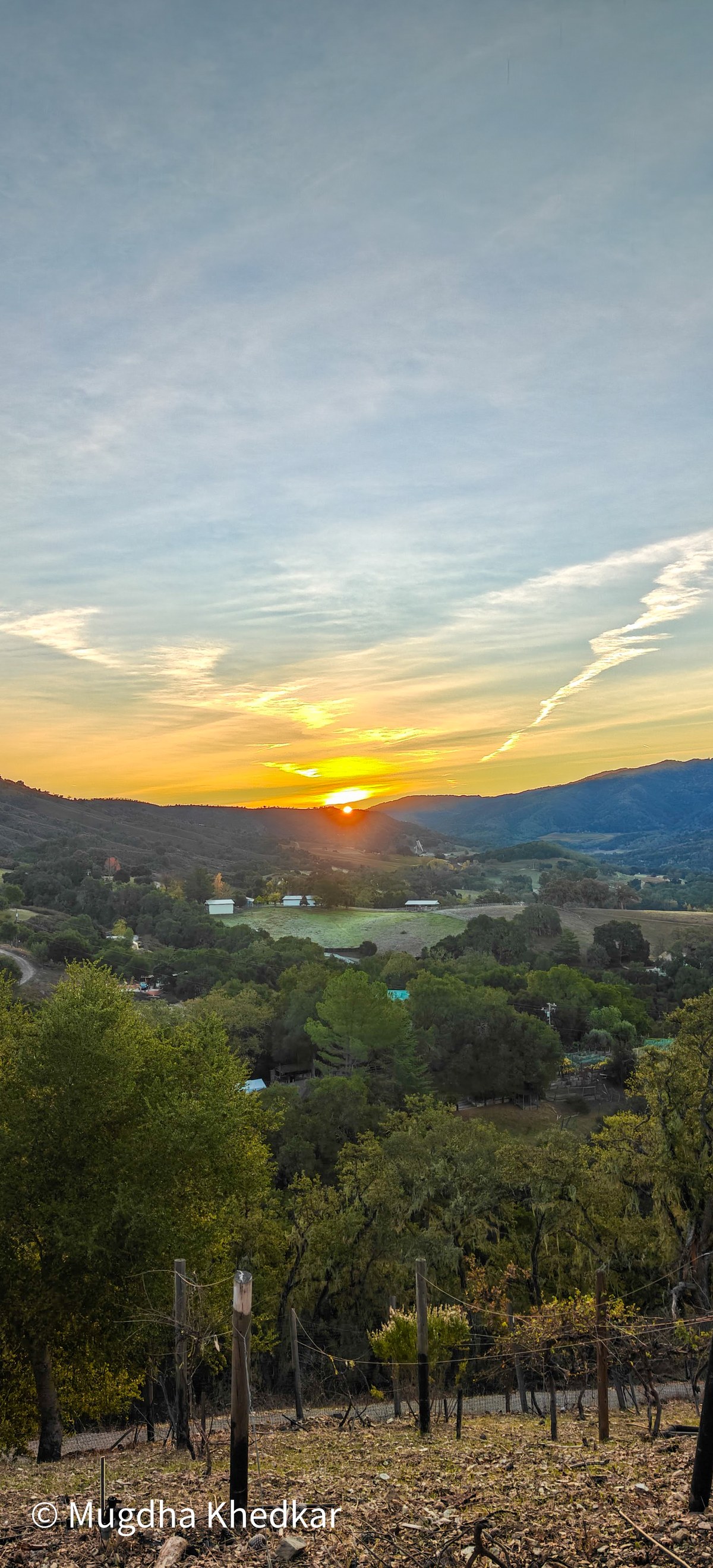Sunrise over the hills of Carmel Valley seen from a hilltop campsite