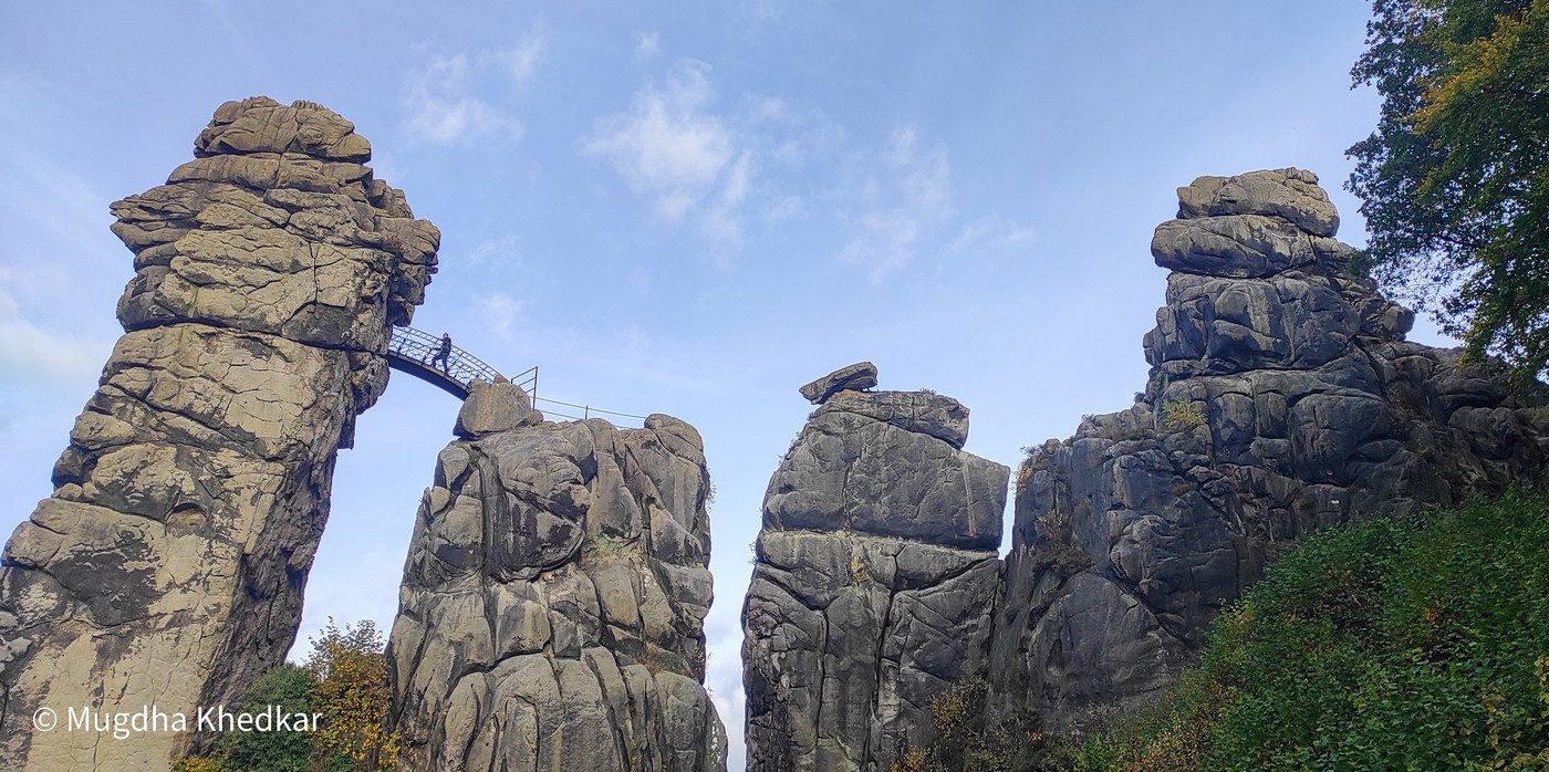 The Externsteine sandstone pillars, linked by a small footbridge, in the Teutoburg Forest