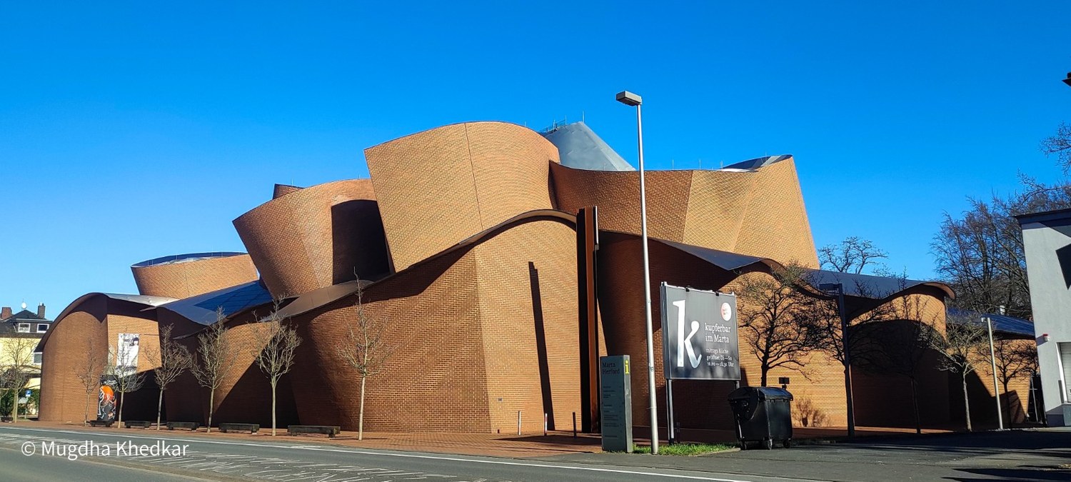 The curving brick walls of the MARTa museum in Herford, designed by Frank Gehry