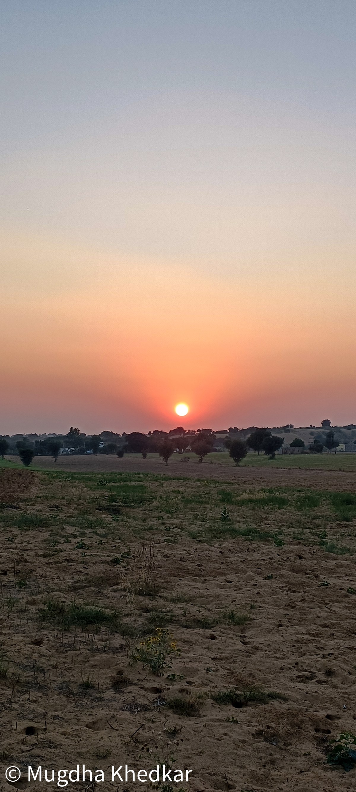 The sun setting over the Thar desert near Manvar